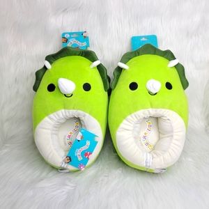 Squishmallows Tristan the Dinosaur plush slippers.